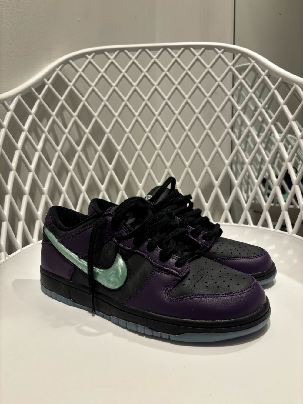 Nike Dunk Low in Purple and Black with Mint Swoosh